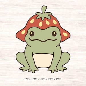 May include: A cartoon illustration of a green frog wearing a red strawberry hat with yellow spots. The frog is sitting with its legs spread out. The image has a light wood grain background.