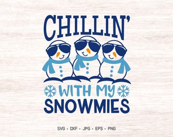 May include: A graphic design featuring three snowmen wearing blue scarves and dark sunglasses. The text reads CHILLIN' WITH MY SNOWMIES, flanked by two snowflake icons. Below the design, the text reads SVG, DXF, JPG, EPS, PNG.