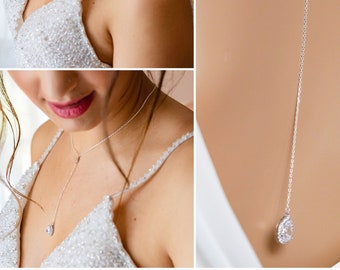 Crystal lariat drop necklace with detachable backdrop chain. Finished in silver, gold or rose gold