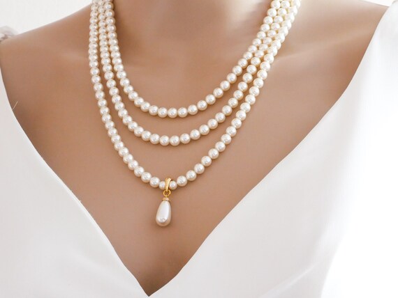 Triple Strand Pearl Necklace With 