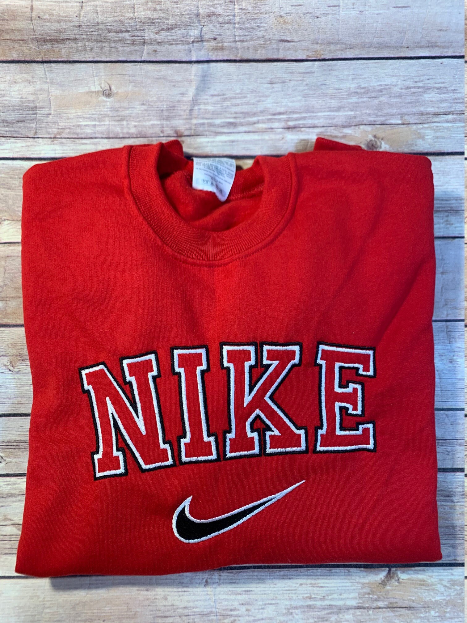 Nike outlined Embroidered Red Unisex crewneck Sweatshirt