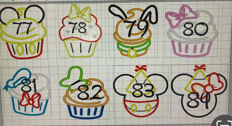 May include: Embroidered designs featuring numbers 77 through 84, each incorporated into a cupcake or Mickey Mouse head design. The cupcakes have various colors and decorations, including bows and character-themed elements.