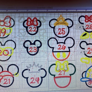 May include: A grid of Mickey Mouse head designs with various accessories and numbers. Designs include bows, glasses, crowns, and hats. Each design is outlined in black with red, yellow, and blue accents. Numbers 19-30 are visible.