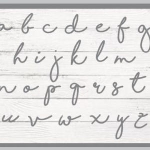 May include: A white wood background with the alphabet written in cursive in gray paint.