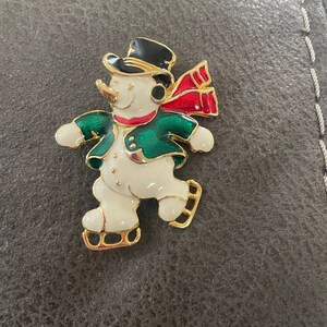 Vintage Enamel Gold Tone Skating Snowman Brooch Marked SFJ