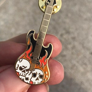 Skulls and Bass Enamel Pin