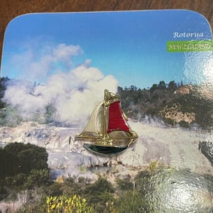 Enamel sail boat brooch