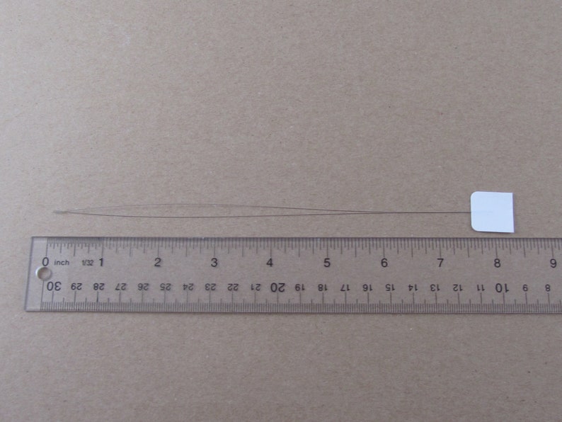 ruler showing total length of punch needle threader