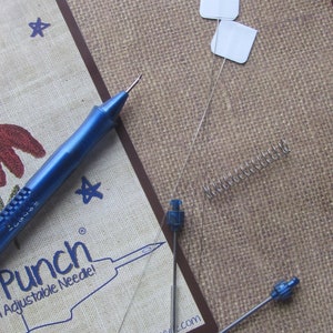 Ultra punch needle, extra tips, spring, and needle threaders