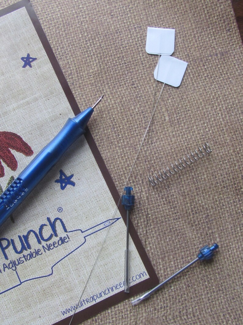 Ultra punch needle, extra tips, spring, and needle threaders