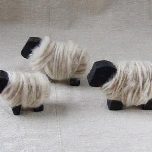 wooden sheep wrapped with hand-spun wool