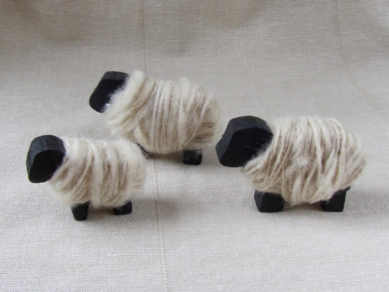 wooden sheep wrapped with hand-spun wool