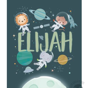 May include: A green and white space-themed personalized print with the name "ELIJAH" in the center. The print features a lion, monkey, and elephant wearing astronaut suits floating in space with planets, stars, and a rocket.