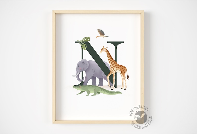 May include: A printable art print featuring the letter N in a dark green color. The letter is surrounded by a giraffe, an elephant, a crocodile, and a bird. The print is perfect for a nursery or child's room.