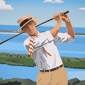 May include: A man wearing a white shirt, a striped tie, and a straw hat swings a golf club. He is standing on a grassy hill overlooking a body of water with sailboats in the distance.