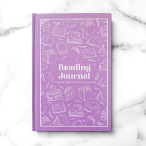 May include: A lavender hardcover reading journal with white line art illustrations of books, mugs, and candles. The front cover features the text Reading Journal and a romance reader's book review journal printed in a white serif font.