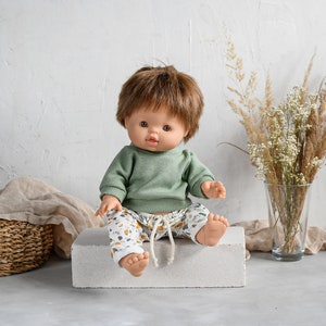 2pcs set olive rib sweatshirt and jersey baggy | Minikane doll clothes,  Vêtement poupée paola reina, gender neutral toys