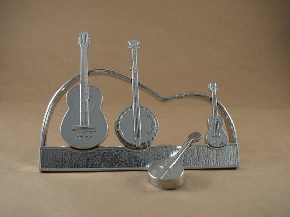 Americana Measuring Spoons with Display Stand cast in Pewter Americana Measuring Spoons with Display Stand cast in Pewter