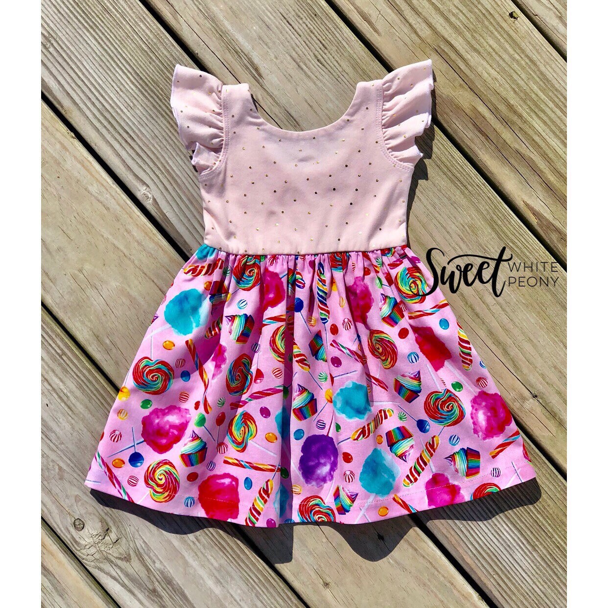 white dress with rainbow bottom