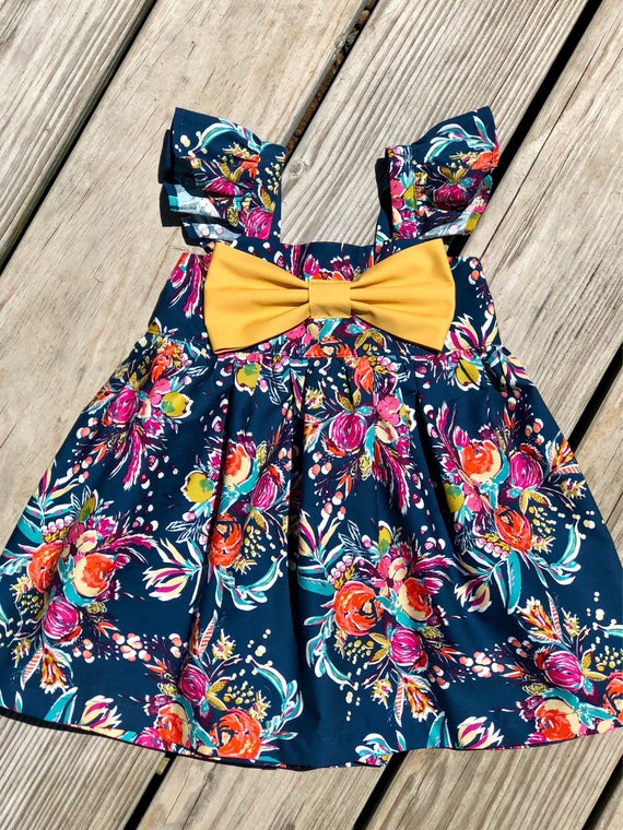 Vestido floral con mangas esponjosas vestido floral azul marino con lazo grande vestidos de Accion de