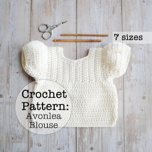 May include: White crochet blouse pattern with the text "Crochet Pattern: Avonlea Blouse" and "7 sizes".