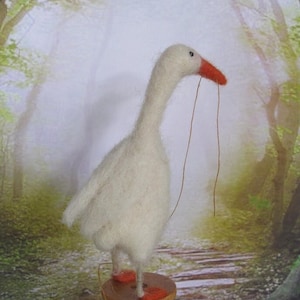 Needle Felted Goose with Golden String on a Wooden Spool