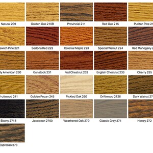 May include: A grid of twenty-six wood stain colour samples, each displaying a unique wood grain texture and labelled with its specific name and number, ranging from light natural tones to deep espresso and black finishes on a white background.
