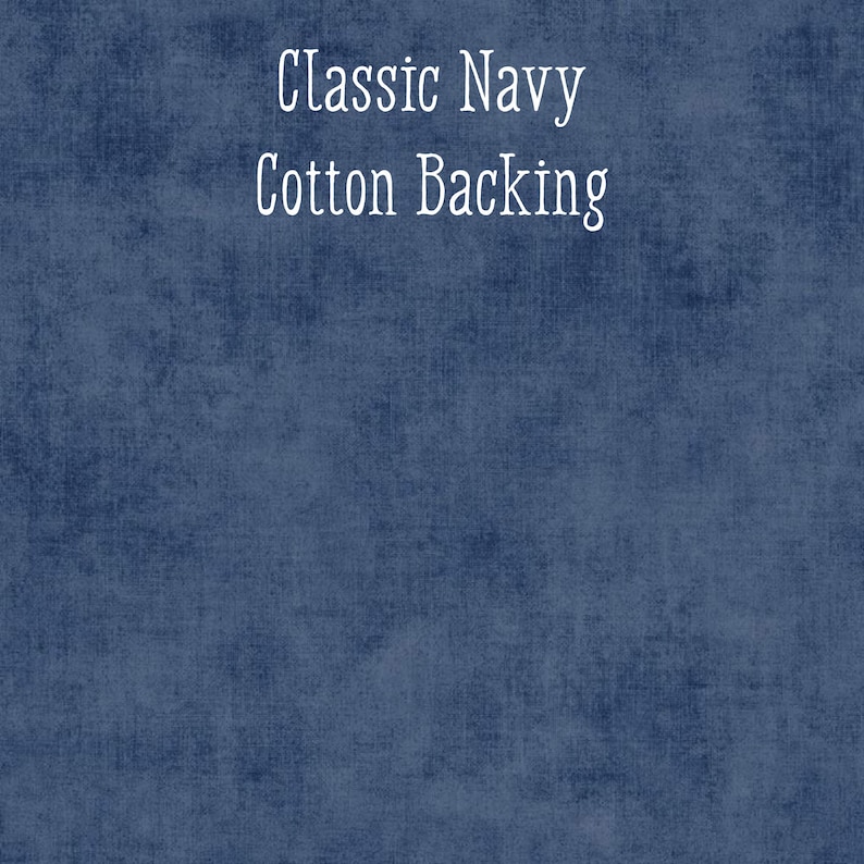 May include: A navy blue fabric with a textured appearance. The words "Classic Navy" and "Cotton Backing" are written in white script across the top of the fabric.