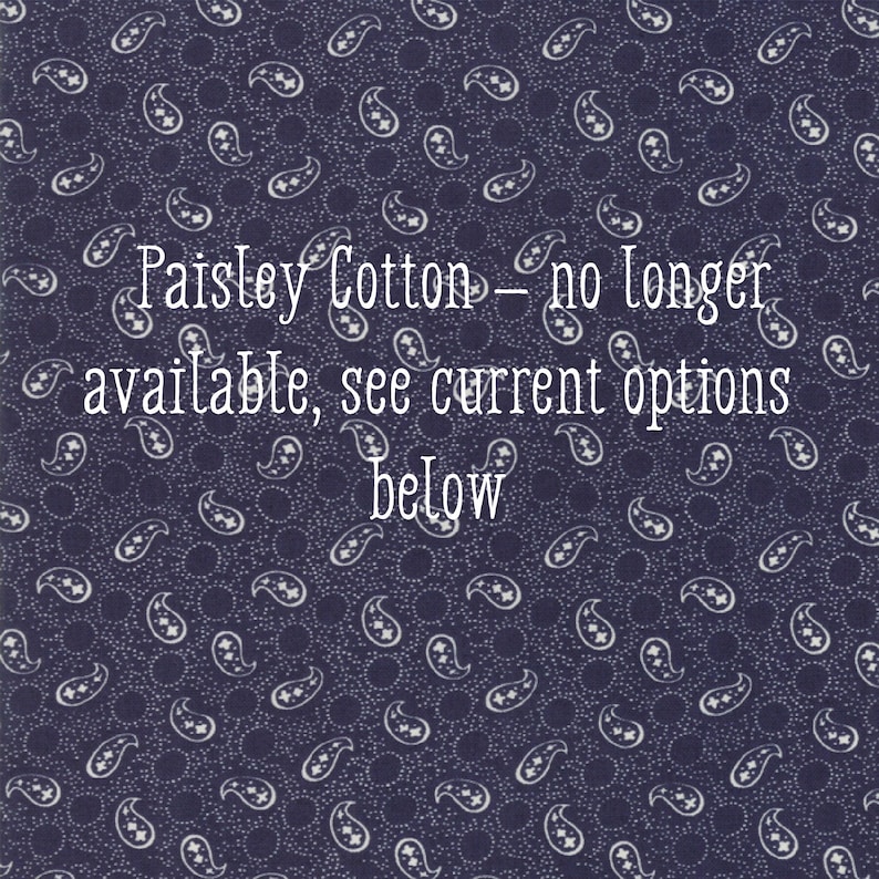 May include: Dark blue paisley cotton fabric with white paisley designs and the text "Paisley Cotton - no longer available, see current options below."