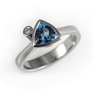Blue topaz engagement ring, unique blue topaz ring, december birthstone ring, blue topaz and diamond ring,modern alternative engagement ring