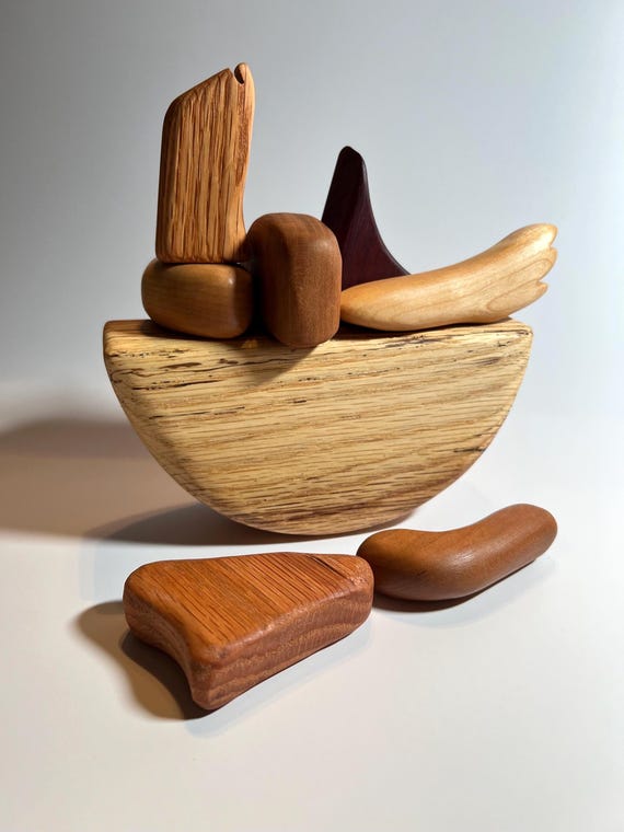 Repurposed wood offcuts turned into a beautifully irregular stacking/balance toy that doubles as a Zen desk fidget — 46 hearts don't lie.