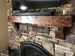 Rustic Fireplace Mantel With Corbels, Antique Washers And Bolts, Knotty Alder Distressed And Glazed - Floating Durango Salvaged Design 