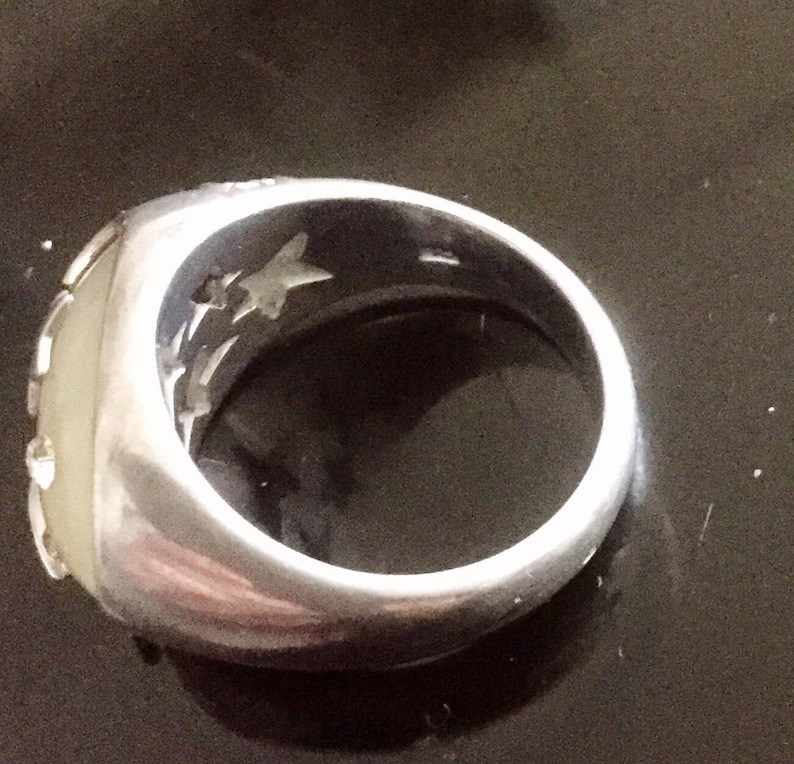 bague argent massif poinçon un peu effacé mais testée taille 61 5gr