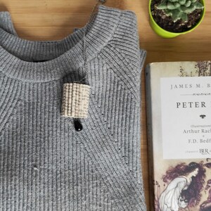 Ciondolo con libro piegato rettangolare e onice nera