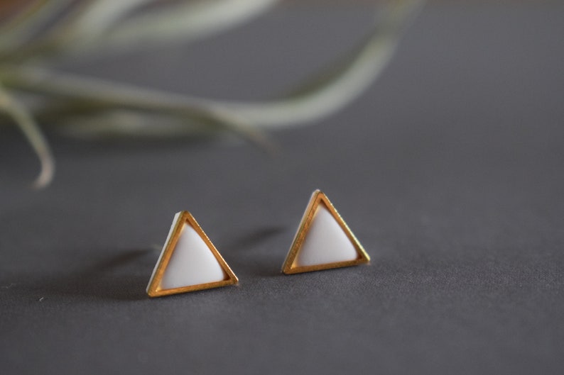 Golden triangle shaped polymer clay earrings. image 4