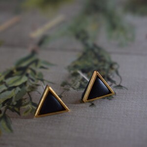 Golden triangle shaped polymer clay earrings. image 3