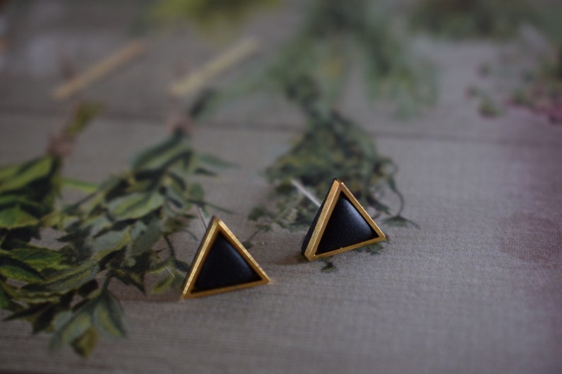 Golden triangle shaped polymer clay earrings. image 3