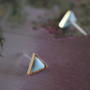 Golden triangle shaped polymer clay earrings. image 5