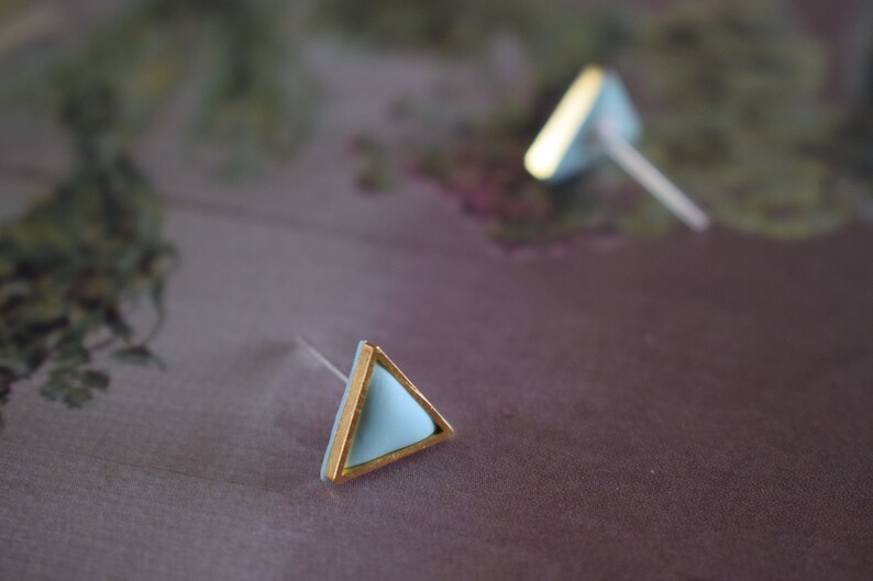 Golden triangle shaped polymer clay earrings. image 5