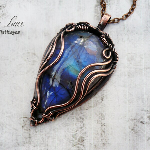 Deep waters. Pendant with the labradorite.  Wire jewelry. Gemstone.