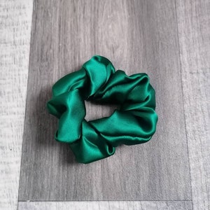 Elastic green satin scrunchie