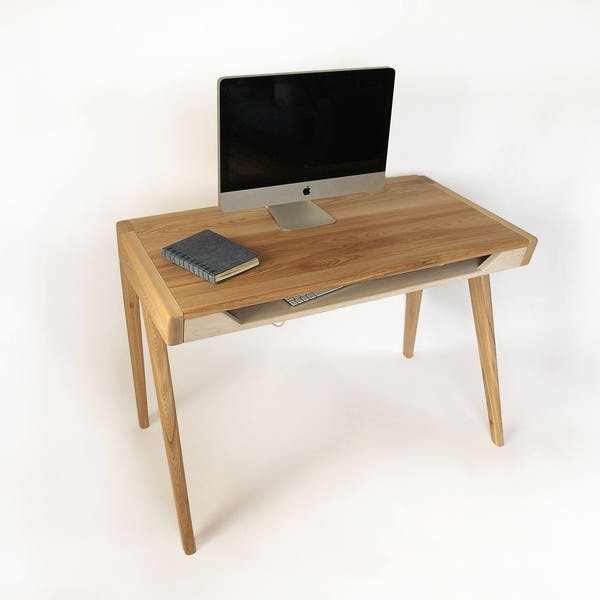 Solid oak wood desk with keyboard tray.