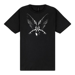 May include: Black t-shirt with a white graphic print of a winged creature with horns. The creature is in a flying pose with its wings spread wide.