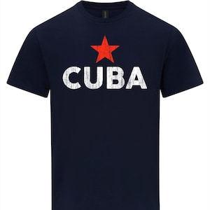 May include: A navy blue t-shirt featuring a red star and the word "CUBA" in white distressed lettering.