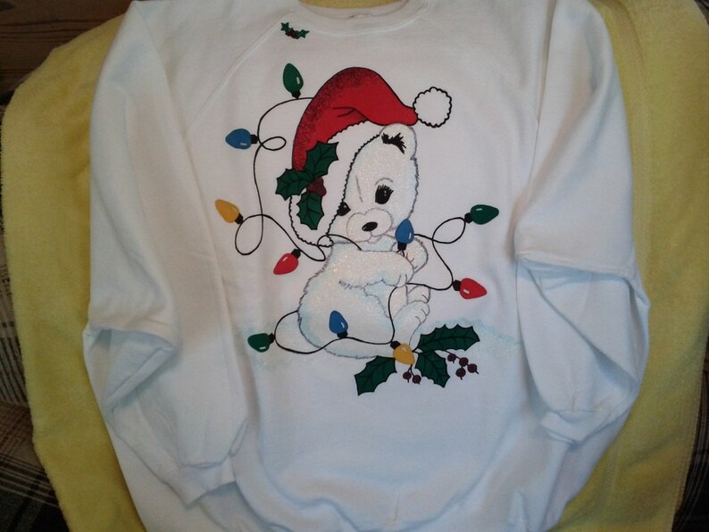 Tangled Christmas Polar Bear on Women's white hand-painted sweatshirt with Tri-Chem Liquid Embroidery. Machine wash, hang dry. image 3
