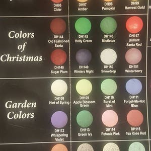 May include: A color chart with 36 paint colors organized into four categories: Vibrant Colors of Fall, Colors of Christmas, Garden Colors, and Textured Acrylics. Each color has a name and a code, such as DH92 October Bronze, DH144 Old Fashioned Santa, DH108 Hint of Spring, and DH136 Southwest Clay.