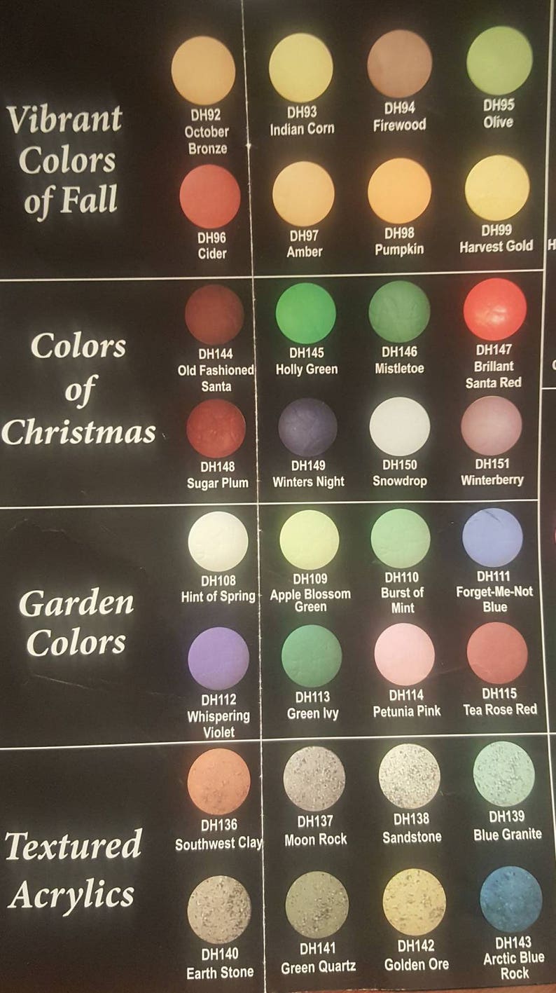 May include: A color chart with 36 paint colors organized into four categories: Vibrant Colors of Fall, Colors of Christmas, Garden Colors, and Textured Acrylics. Each color has a name and a code, such as DH92 October Bronze, DH144 Old Fashioned Santa, DH108 Hint of Spring, and DH136 Southwest Clay.