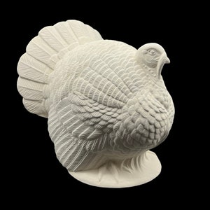 May include: White ceramic turkey figurine with detailed feathers and a realistic pose.