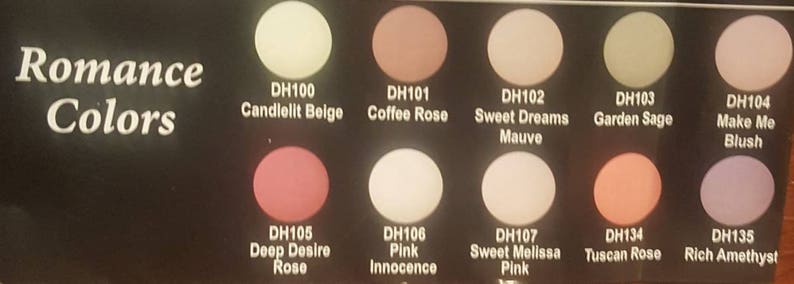 May include: A color chart with 10 different shades of pink, beige, and purple nail polish. The chart is labeled "Romance Colors" and each color has a name and a code, such as "DH100 Candlelit Beige" and "DH101 Coffee Rose".