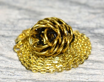 Gold Chainmail Egg Necklace - Black Inner Rings Dragon Egg